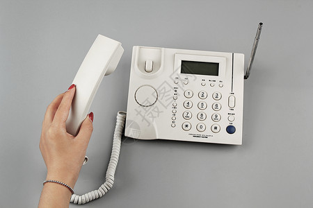 白色的电话座机背景图片