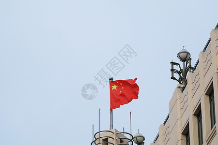 祖国节假日国庆上海城市国旗飘扬背景