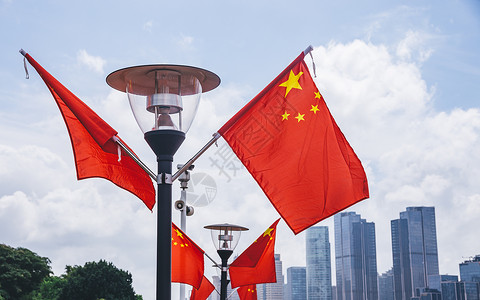 路灯旗帜上海旅游景点红旗国庆象征背景