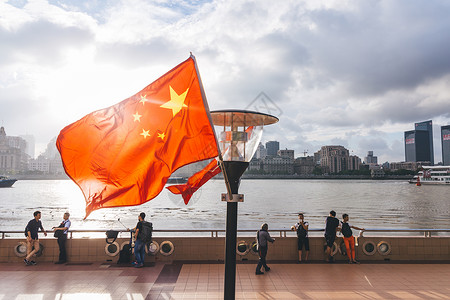 法定中国节日逆光外滩国庆五星红旗背景