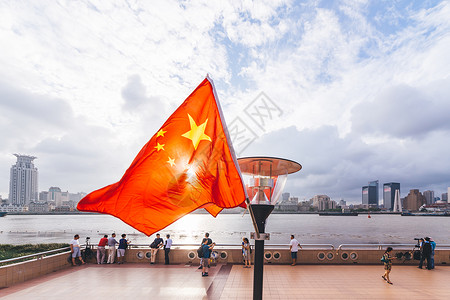 14周年纪念日上海浦东滨江大道日落国旗背景
