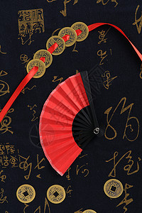 国庆节72周年文字设计铜钱纸扇中国风元素组合背景