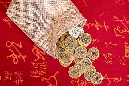 麻袋中国风清代铜钱拍摄背景图片
