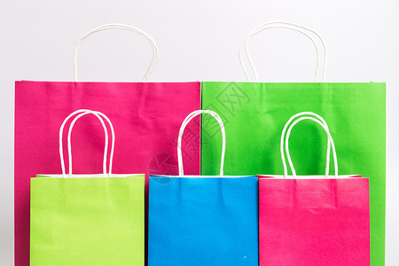 多种不同颜色大小购物袋背景图片