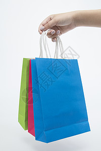 蓝色淘宝背景多个不同颜色手提袋购物袋背景