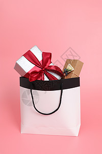 购物袋创意简约装满礼物的购物袋背景
