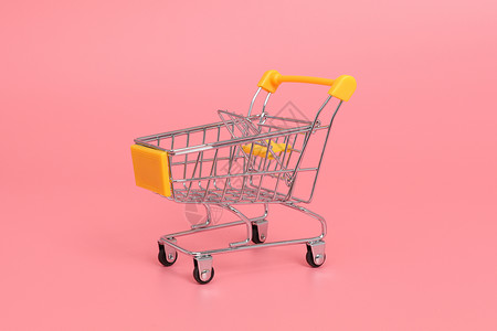 黄色超市购物手推车背景图片