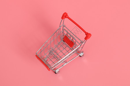 超市礼盒红色超市购物手推车背景