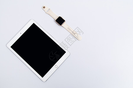 苹果Ipad平板电脑和智能手表摆拍背景