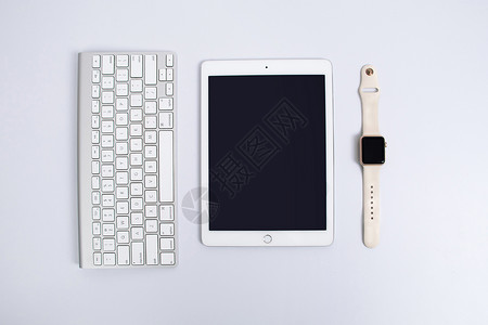 平板电脑和键盘苹果键盘平板电脑智能手表背景