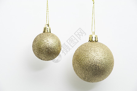 黑金背景金色背景金色磨砂背景圣诞球装饰球白底拍摄背景