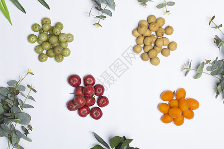 龙眼叶子桌上的各种水果背景