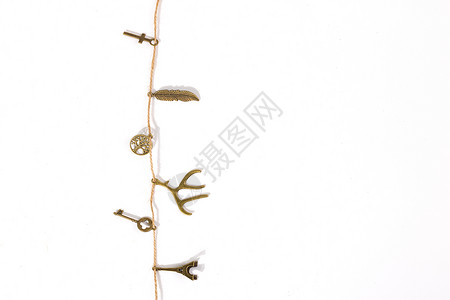 ps素材鹿角用麻绳串起来的装饰品背景