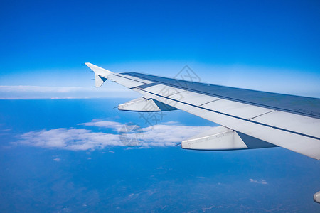 高空拍摄飞机机舱内拍摄机翼背景