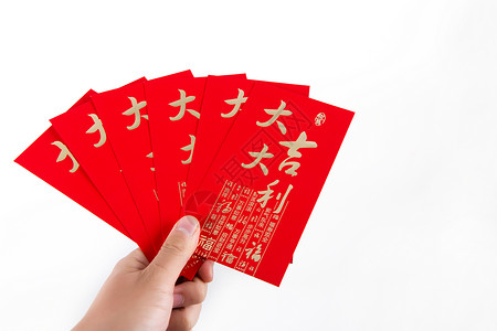 年轻男性春节红包展示棚拍背景图片