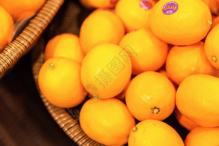 高档超市水果橙子摊位展示背景图片