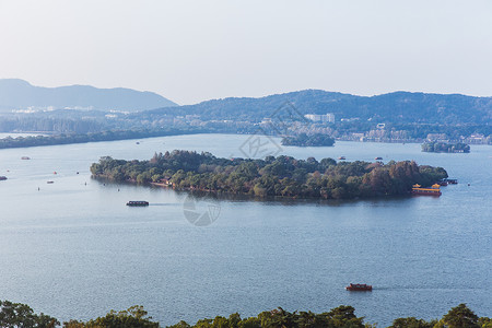 杭州西湖蓝天湖中岛背景图片