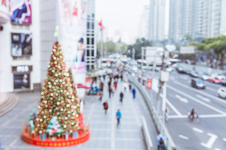 商场圣诞树温馨装扮虚化背景图片