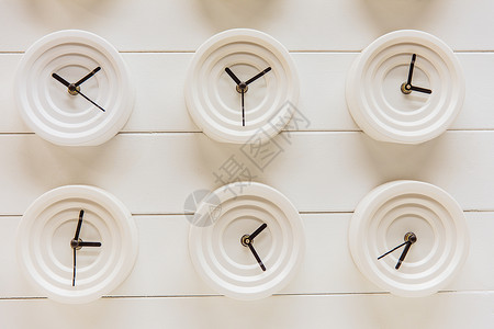 瓷砖底纹商场时尚纯白设计时钟排列背景