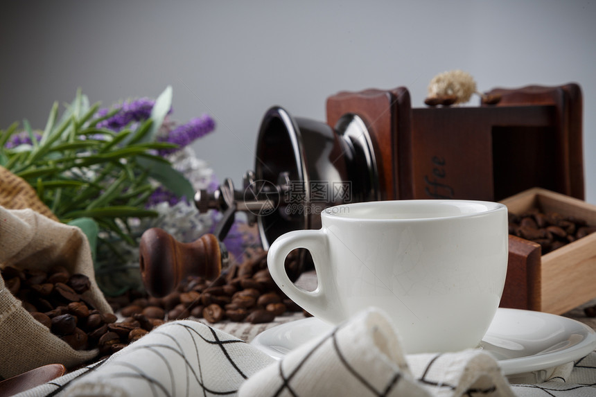 咖啡杯咖啡机餐布的静物摄影图片