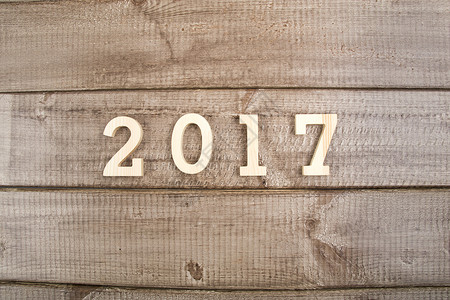 木底板上的数字2017背景图片