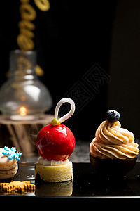 圣诞主题cupcake胶片风格美食摄影背景图片
