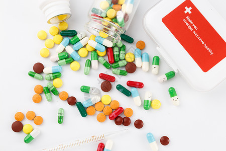 简单医学素材各种颜色彩色的药片和胶囊背景