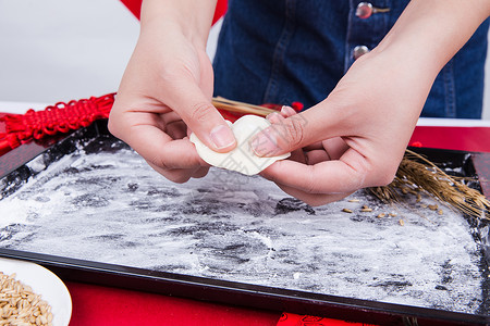 撒红节冬至过年正在制作手工饺子背景