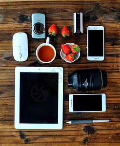 茶手机平铺拍摄的电子产品背景