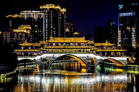 古桥夜景灯光城市背景