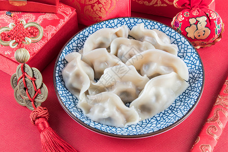 财神红色中国年传统美食水饺背景