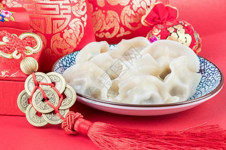 收取红包袋中国年传统美食水饺背景