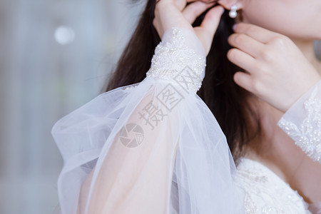 布料细节美丽女人婚纱袖套设计背景