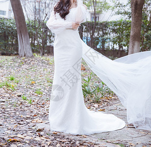 婚礼布料素材室外清新穿白色婚纱的女人背景