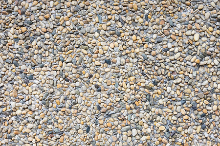褐砂石鹅卵石墙面背景背景