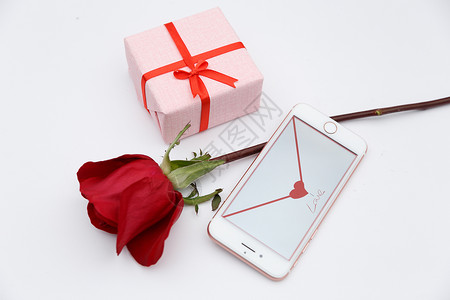 玫瑰花和手机背景图片