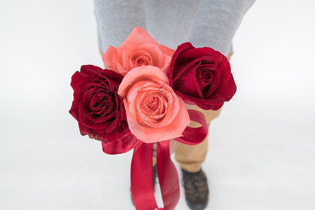 小清新妇女节情人节送一束玫瑰花背景