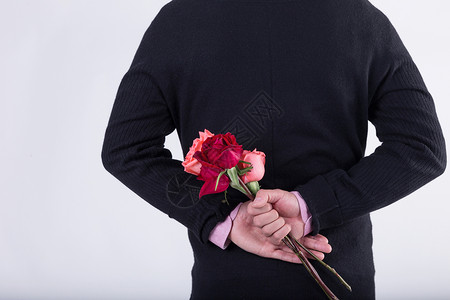 浪漫底图男生手拿玫瑰背景