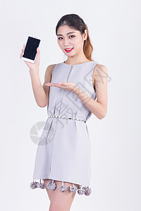 商务套裙女性展示手机背景图片