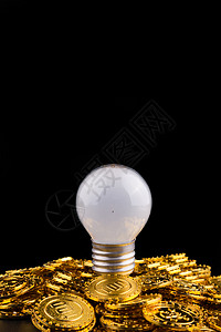金融灯泡灯泡和金币背景
