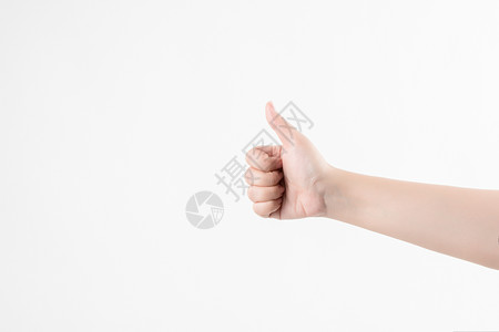 大拇指特写白背景白手指高清图片