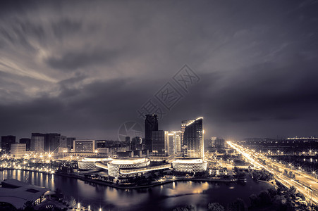 宁波图书馆魔幻的云下的城市夜景背景