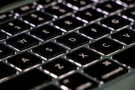橙黑色科技科技感背光键盘背景