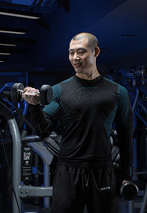 健身房健身运动肌肉动作示范背景图片