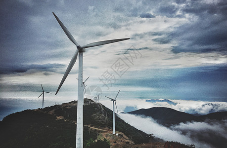 风能环保高山上的风能电力发电风车背景