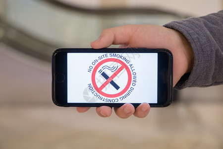 手机危害用手机宣传世界禁烟日背景
