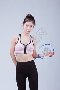 青春活动运动美女打羽毛球背景图片