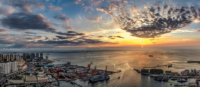 归航海湾夕阳全景图背景