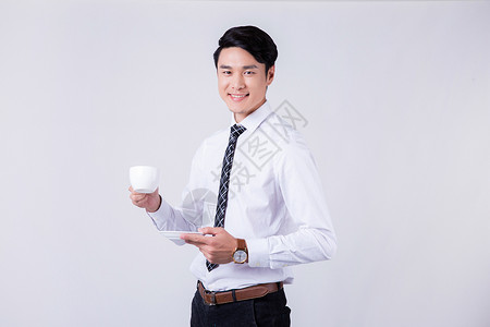 励志创业手拿咖啡杯商务男士半身像背景