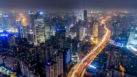 曝光量现代都市航拍城市夜景背景
